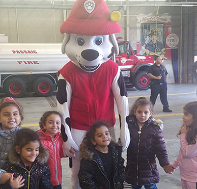Students with Fire dog character