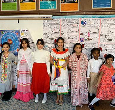 Students in different cultural dresses